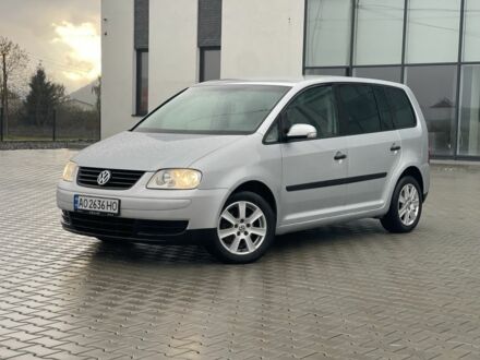 Серый Фольксваген Туран, объемом двигателя 1.9 л и пробегом 304 тыс. км за 5600 $, фото 1 на Automoto.ua