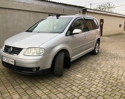 Серый Фольксваген Туран, объемом двигателя 2 л и пробегом 380 тыс. км за 5700 $, фото 1 на Automoto.ua