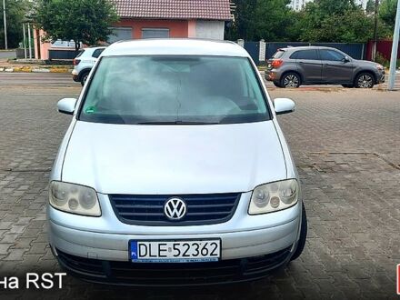 Серый Фольксваген Туран, объемом двигателя 1.9 л и пробегом 231 тыс. км за 2700 $, фото 1 на Automoto.ua