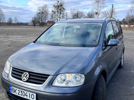 Фольксваген Туран 2003 у Заречном на Automoto.ua Сірий Фольксваген Туран, об'ємом двигуна 1.6 л та пробігом 257 тис. км за 5200 $, фото 1 на Automoto.ua