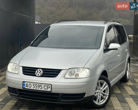 Серый Фольксваген Туран, объемом двигателя 1.9 л и пробегом 290 тыс. км за 4600 $, фото 1 на Automoto.ua