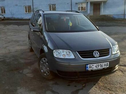 Серый Фольксваген Туран, объемом двигателя 1.6 л и пробегом 256 тыс. км за 5222 $, фото 1 на Automoto.ua