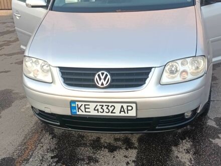 Серый Фольксваген Туран, объемом двигателя 1.6 л и пробегом 210 тыс. км за 4500 $, фото 1 на Automoto.ua