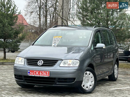 Серый Фольксваген Туран, объемом двигателя 1.6 л и пробегом 211 тыс. км за 5950 $, фото 1 на Automoto.ua