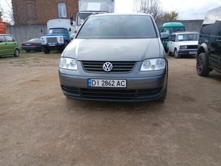 Серый Фольксваген Туран, объемом двигателя 1.6 л и пробегом 311 тыс. км за 5500 $, фото 1 на Automoto.ua