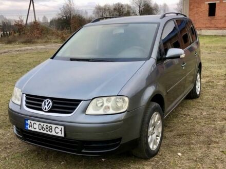 Серый Фольксваген Туран, объемом двигателя 2 л и пробегом 350 тыс. км за 5499 $, фото 1 на Automoto.ua