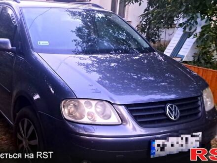Фольксваген Туран 2004 в Чернигове на Automoto.ua Серый Фольксваген Туран, объемом двигателя 19 л и пробегом 400 тыс. км за 5700 $, фото 1 на Automoto.ua