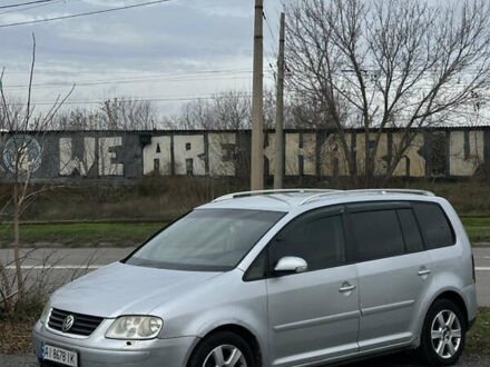 Серый Фольксваген Туран, объемом двигателя 1.97 л и пробегом 281 тыс. км за 4500 $, фото 1 на Automoto.ua