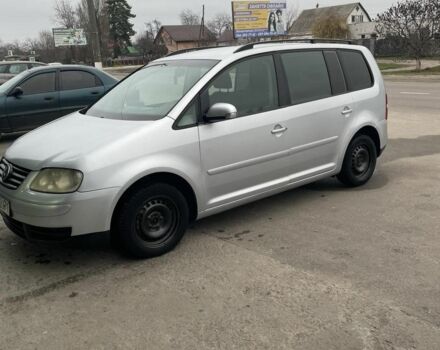 Серый Фольксваген Туран, объемом двигателя 1.9 л и пробегом 330 тыс. км за 2300 $, фото 1 на Automoto.ua