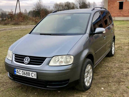 Серый Фольксваген Туран, объемом двигателя 1.97 л и пробегом 350 тыс. км за 5500 $, фото 1 на Automoto.ua