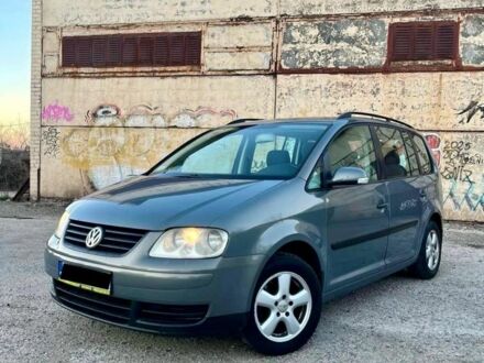 Серый Фольксваген Туран, объемом двигателя 1.9 л и пробегом 390 тыс. км за 2700 $, фото 1 на Automoto.ua