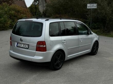 Серый Фольксваген Туран, объемом двигателя 1.9 л и пробегом 277 тыс. км за 1546 $, фото 1 на Automoto.ua