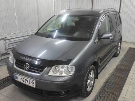 Сірий Фольксваген Туран, об'ємом двигуна 2 л та пробігом 293 тис. км за 6100 $, фото 1 на Automoto.ua