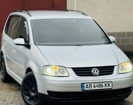 Серый Фольксваген Туран, объемом двигателя 1.6 л и пробегом 180 тыс. км за 6550 $, фото 1 на Automoto.ua