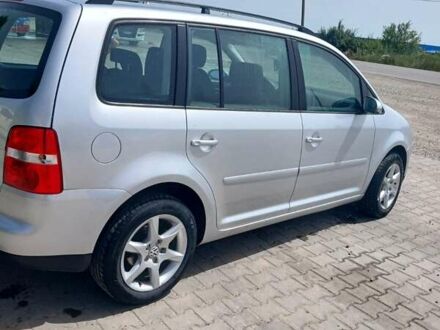 Сірий Фольксваген Туран, об'ємом двигуна 2 л та пробігом 250 тис. км за 5800 $, фото 1 на Automoto.ua