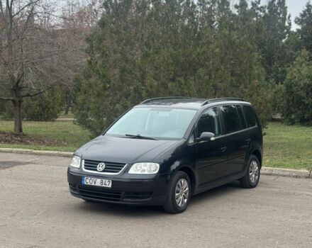 Серый Фольксваген Туран, объемом двигателя 2 л и пробегом 250 тыс. км за 3550 $, фото 1 на Automoto.ua