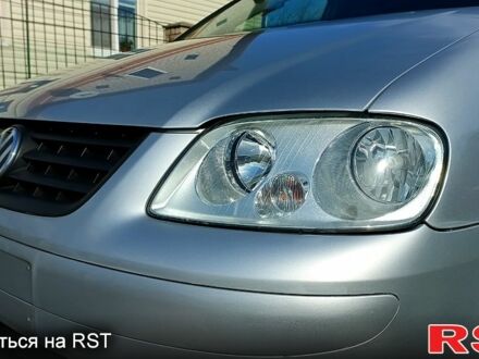 Фольксваген Туран 2005 у Миргороде на Automoto.ua Сірий Фольксваген Туран, об'ємом двигуна 16 л та пробігом 242 тис. км за 6500 $, фото 1 на Automoto.ua