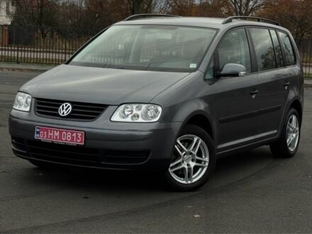 Серый Фольксваген Туран, объемом двигателя 1.6 л и пробегом 223 тыс. км за 6300 $, фото 1 на Automoto.ua