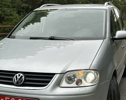 Серый Фольксваген Туран, объемом двигателя 1.6 л и пробегом 2 тыс. км за 6600 $, фото 1 на Automoto.ua