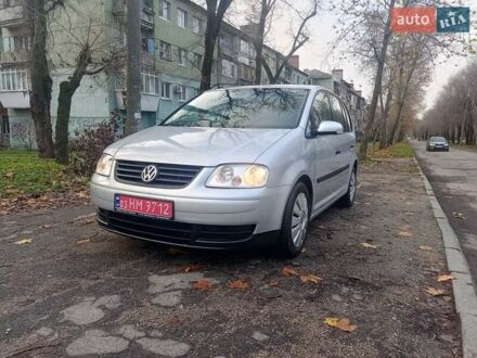 Сірий Фольксваген Туран, об'ємом двигуна 1.6 л та пробігом 230 тис. км за 5995 $, фото 1 на Automoto.ua