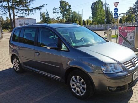 Серый Фольксваген Туран, объемом двигателя 2 л и пробегом 224 тыс. км за 3494 $, фото 1 на Automoto.ua