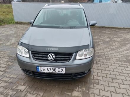 Серый Фольксваген Туран, объемом двигателя 2 л и пробегом 320 тыс. км за 6200 $, фото 1 на Automoto.ua