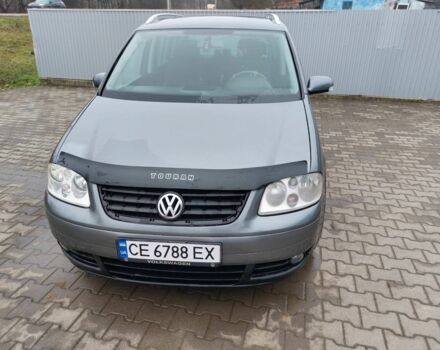 Серый Фольксваген Туран, объемом двигателя 2 л и пробегом 320 тыс. км за 6200 $, фото 1 на Automoto.ua