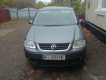 Серый Фольксваген Туран, объемом двигателя 1.6 л и пробегом 256 тыс. км за 5700 $, фото 1 на Automoto.ua