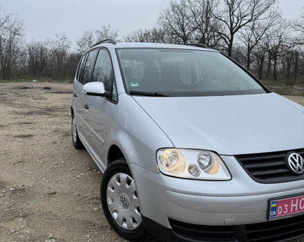 Серый Фольксваген Туран, объемом двигателя 1.6 л и пробегом 213 тыс. км за 6900 $, фото 1 на Automoto.ua