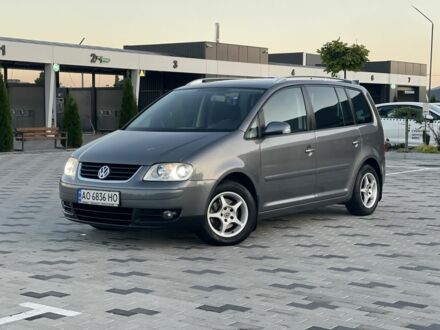 Сірий Фольксваген Туран, об'ємом двигуна 2 л та пробігом 274 тис. км за 5800 $, фото 1 на Automoto.ua