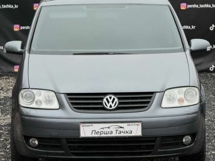 Серый Фольксваген Туран, объемом двигателя 2 л и пробегом 300 тыс. км за 7500 $, фото 1 на Automoto.ua