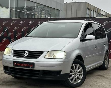 Серый Фольксваген Туран, объемом двигателя 1.6 л и пробегом 338 тыс. км за 5500 $, фото 1 на Automoto.ua