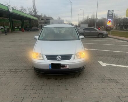 Серый Фольксваген Туран, объемом двигателя 2 л и пробегом 306 тыс. км за 3300 $, фото 1 на Automoto.ua