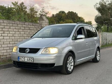 Сірий Фольксваген Туран, об'ємом двигуна 2 л та пробігом 250 тис. км за 3516 $, фото 1 на Automoto.ua