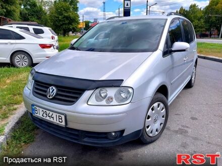 Сірий Фольксваген Туран, об'ємом двигуна 1.6 л та пробігом 219 тис. км за 6699 $, фото 1 на Automoto.ua