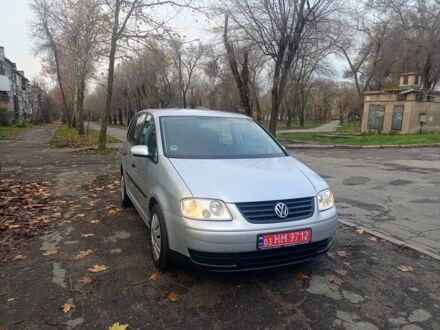 Сірий Фольксваген Туран, об'ємом двигуна 1.6 л та пробігом 230 тис. км за 5995 $, фото 1 на Automoto.ua