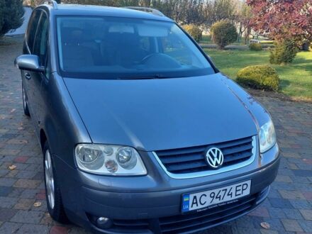 Сірий Фольксваген Туран, об'ємом двигуна 1.9 л та пробігом 185 тис. км за 7400 $, фото 1 на Automoto.ua