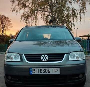 Фольксваген Туран 2005 у Черкасах на Automoto.ua Сірий Фольксваген Туран, об'ємом двигуна 1.9 л та пробігом 254 тис. км за 5950 $, фото 1 на Automoto.ua