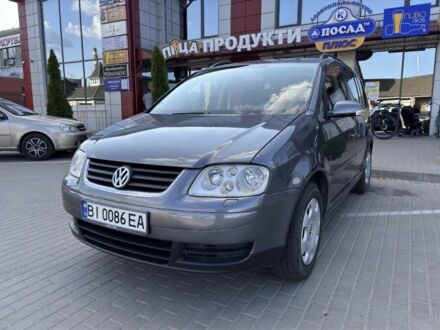 Сірий Фольксваген Туран, об'ємом двигуна 1.6 л та пробігом 180 тис. км за 5200 $, фото 1 на Automoto.ua