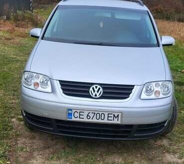 Серый Фольксваген Туран, объемом двигателя 1.6 л и пробегом 269 тыс. км за 6200 $, фото 1 на Automoto.ua