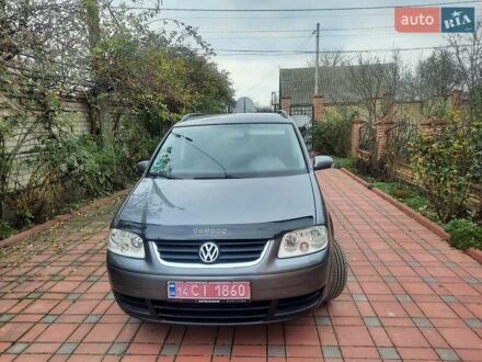 Серый Фольксваген Туран, объемом двигателя 1.6 л и пробегом 193 тыс. км за 6400 $, фото 1 на Automoto.ua