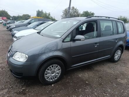 Серый Фольксваген Туран, объемом двигателя 1 л и пробегом 233 тыс. км за 5750 $, фото 1 на Automoto.ua