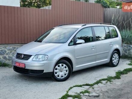 Серый Фольксваген Туран, объемом двигателя 1.6 л и пробегом 270 тыс. км за 6499 $, фото 1 на Automoto.ua