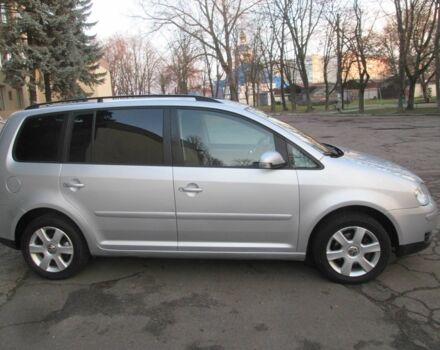 Серый Фольксваген Туран, объемом двигателя 1.6 л и пробегом 230 тыс. км за 6500 $, фото 1 на Automoto.ua