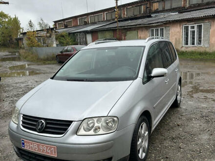Фольксваген Туран 2006 у Косове на Automoto.ua Сірий Фольксваген Туран, об'ємом двигуна 1.6 л та пробігом 235 тис. км за 5900 $, фото 1 на Automoto.ua