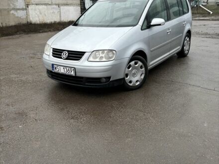 Серый Фольксваген Туран, объемом двигателя 1.9 л и пробегом 350 тыс. км за 2900 $, фото 1 на Automoto.ua