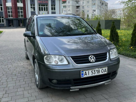 Серый Фольксваген Туран, объемом двигателя 1.98 л и пробегом 313 тыс. км за 5299 $, фото 1 на Automoto.ua