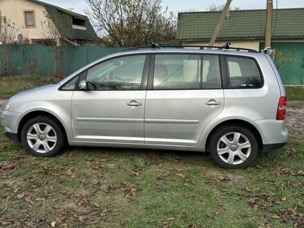 Серый Фольксваген Туран, объемом двигателя 1.9 л и пробегом 233 тыс. км за 6300 $, фото 1 на Automoto.ua