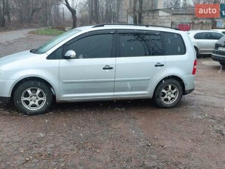 Фольксваген Туран 2006 у Кривому Розі на Automoto.ua Сірий Фольксваген Туран, об'ємом двигуна 1.6 л та пробігом 221 тис. км за 4999 $, фото 1 на Automoto.ua