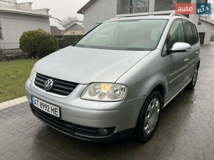 Сірий Фольксваген Туран, об'ємом двигуна 1.97 л та пробігом 305 тис. км за 6800 $, фото 1 на Automoto.ua